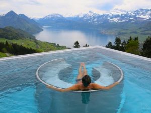 A man relaxing in swimming pool